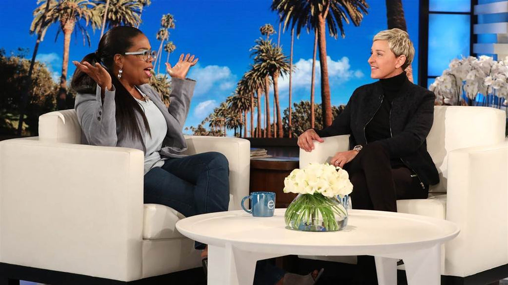 Oprahs wears Larkspur & Hawk Sadie Round and Pear drop earrings in ice and dove for an appearance on Ellen
