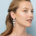 alt-L&HBride-long-girandole-earrings-porcelain-model img-lifestyle