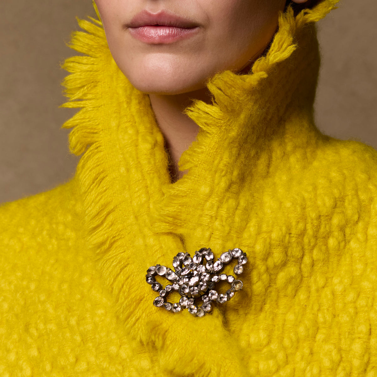 Antique Georgian paste bow brooch, ca 1760, worn on a yellow knit collar